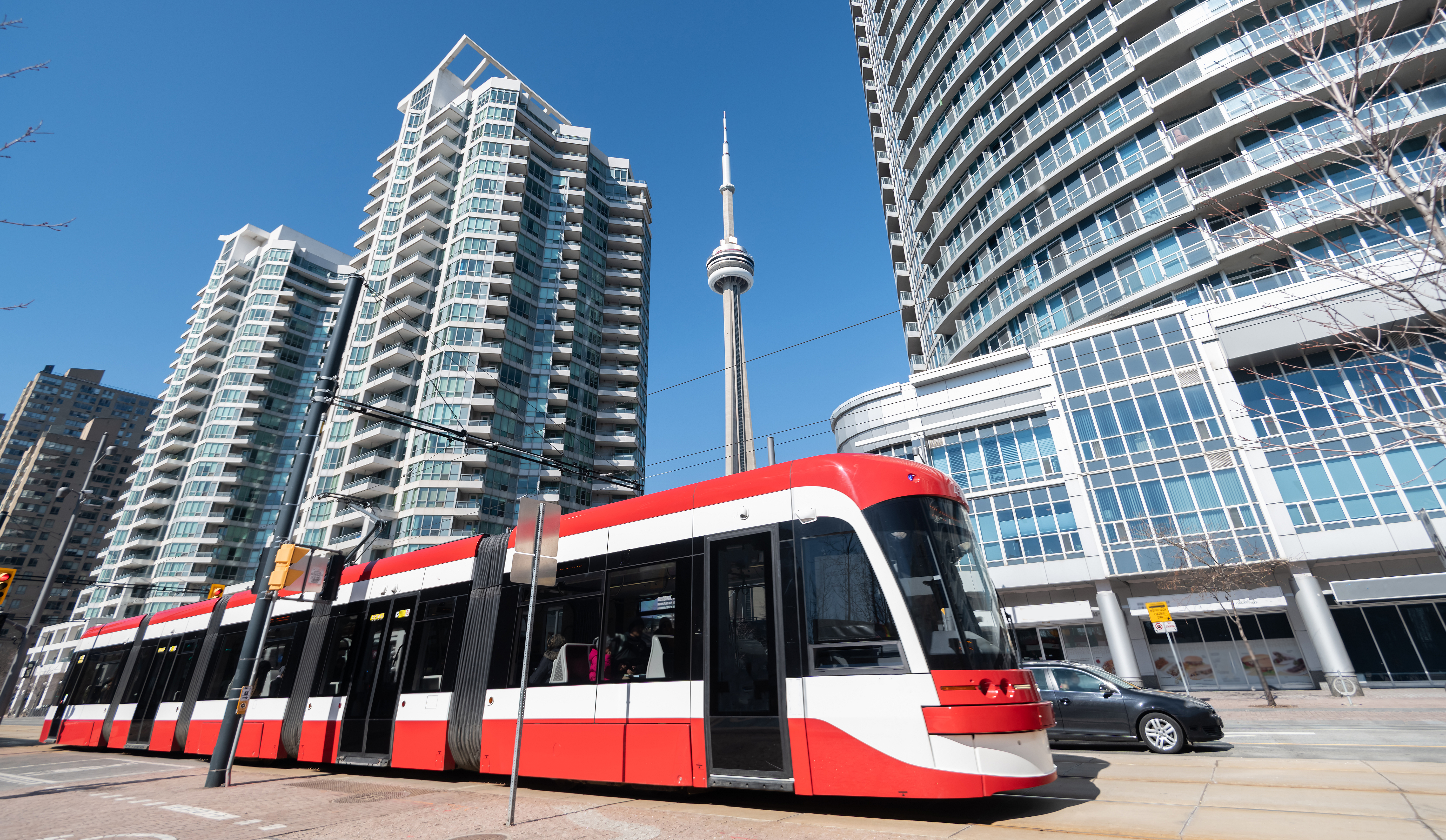 TTC street car in front of CN tower